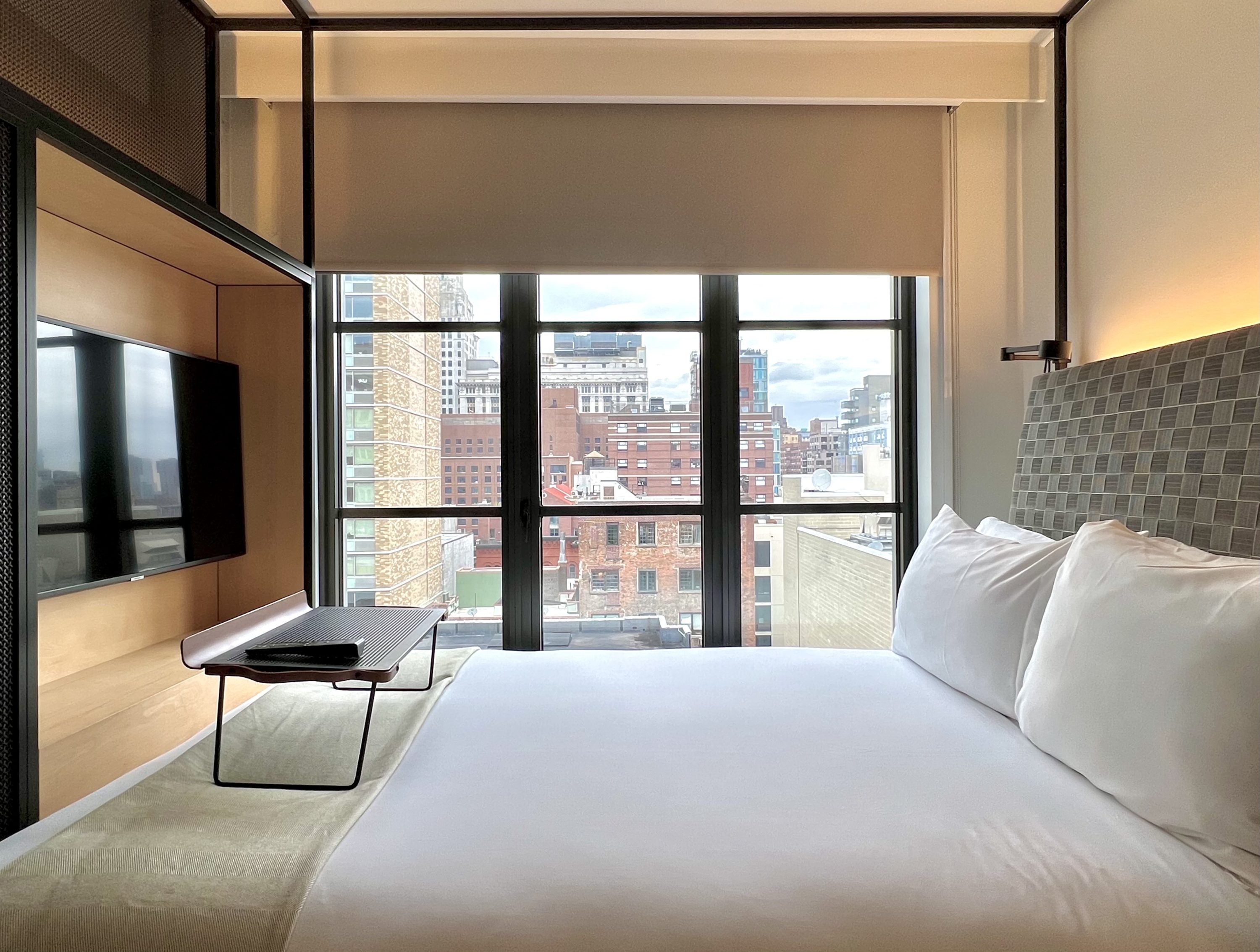 Moxy East Village bedroom bed view by day