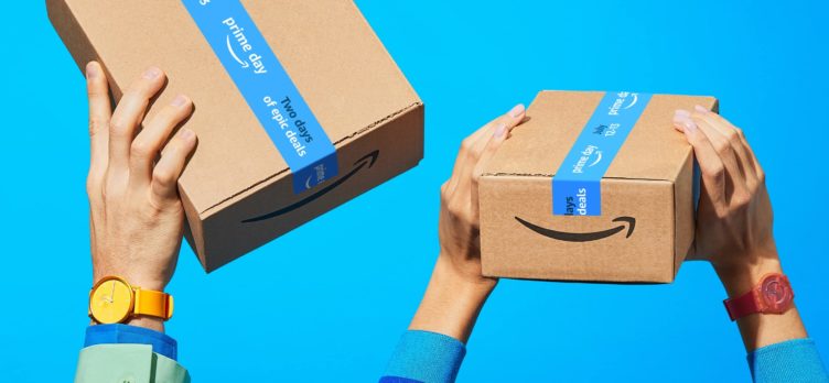 Amazon boxes with 2 sets of hands