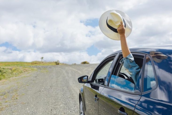 Car with Driver Waiving Hat