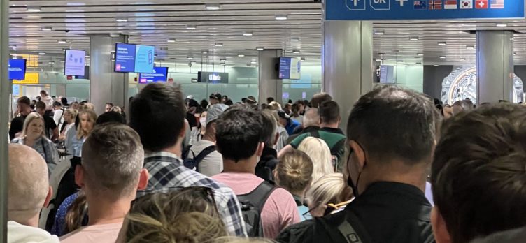 Passengers queuing to clear passport control at Heathrow's Terminal 3