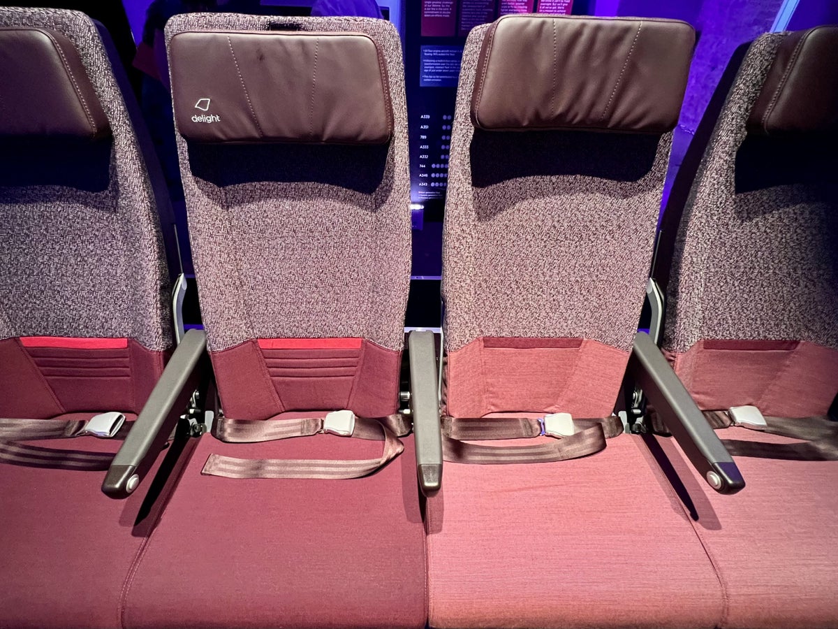 Side-by-side comparison of Virgin's Economy Delight and Economy Classic seats on an Airbus A330neo