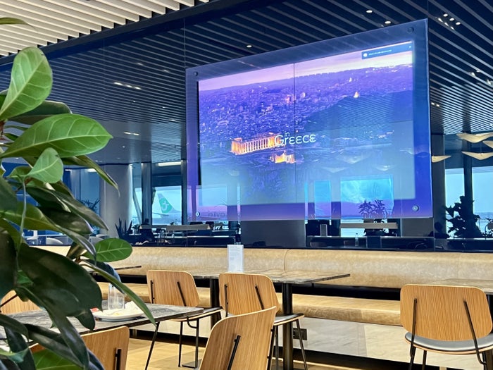 Aegean upgrade bid Aegean Lounge big screen