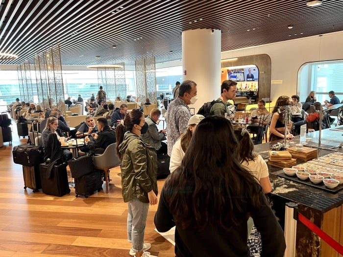 Avianca Boeing 787 Business Class MIA Turkish Airlines Lounge food queue