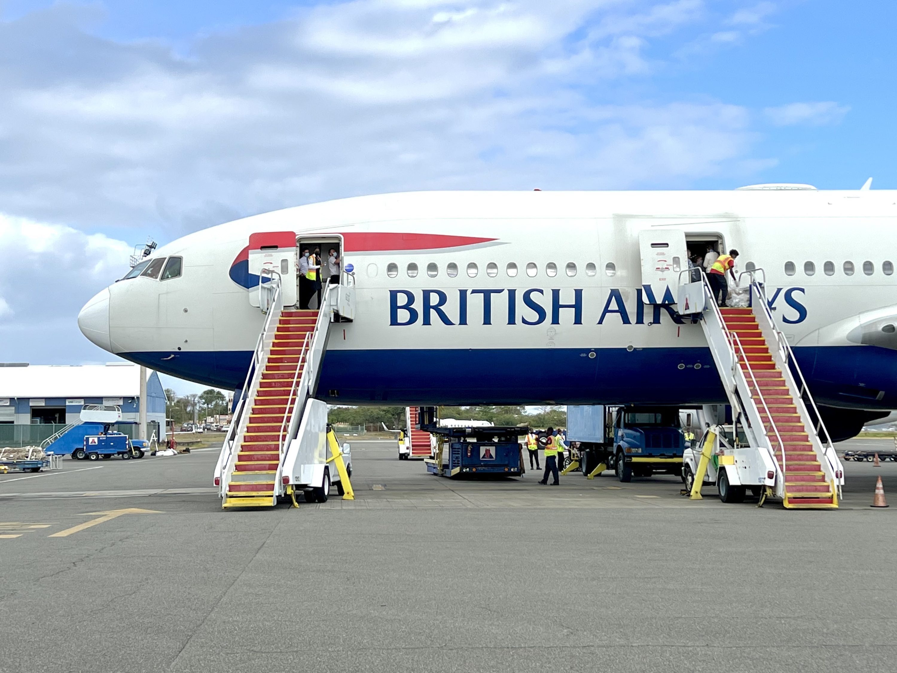 British Airways Boeing 777 200 Club World UVF boarding via steps