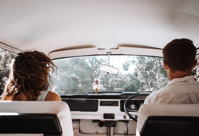 Couple driving in car Couple driving in car