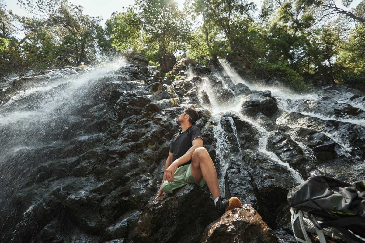 Man enjoying waterfall