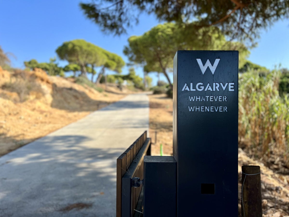 W Algarve Whatever Whenever sign