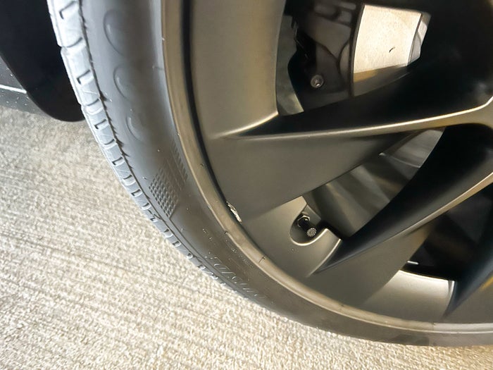 Hertz Tesla Model Y curb rash