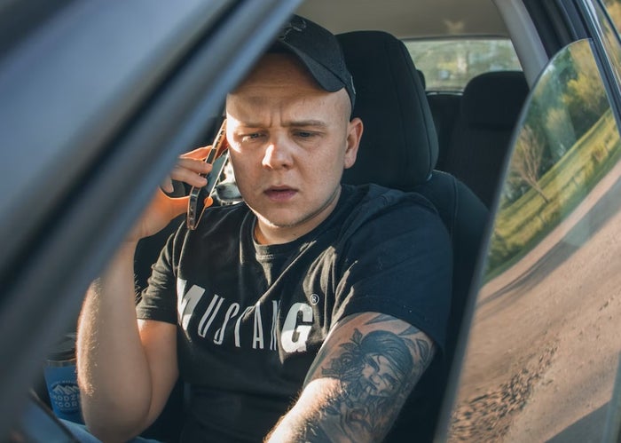Man making emergency phone call