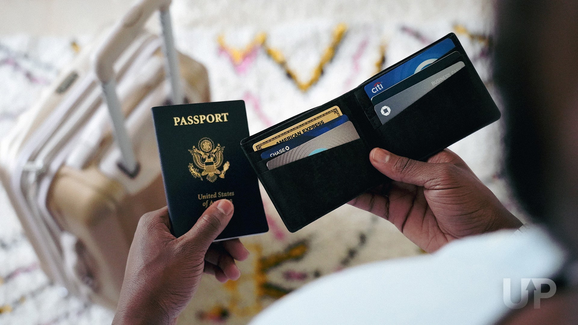 Credit Cards in Wallet Suitcase Upgraded Points LLC