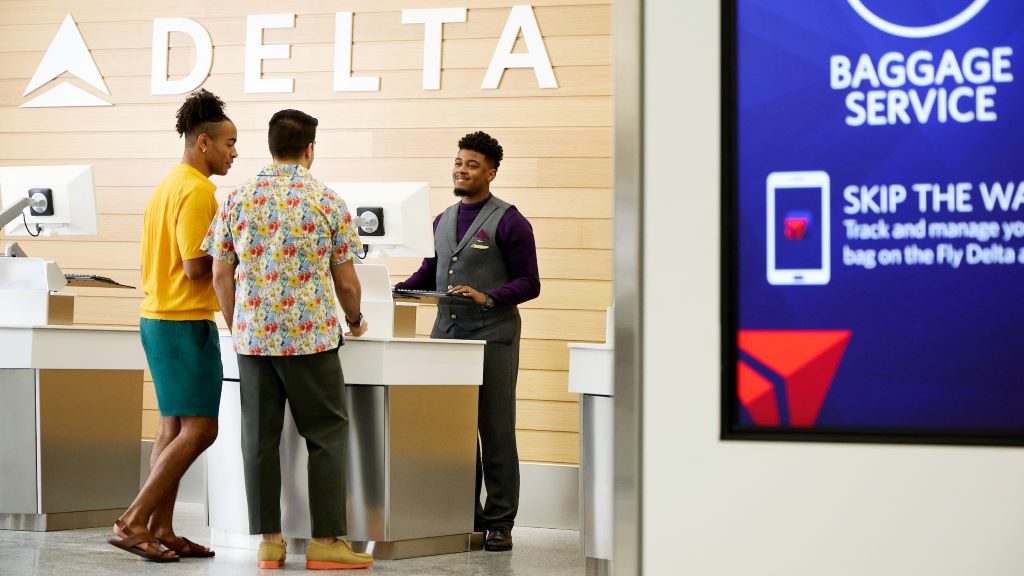 Passengers checking in at Delta Sky Club