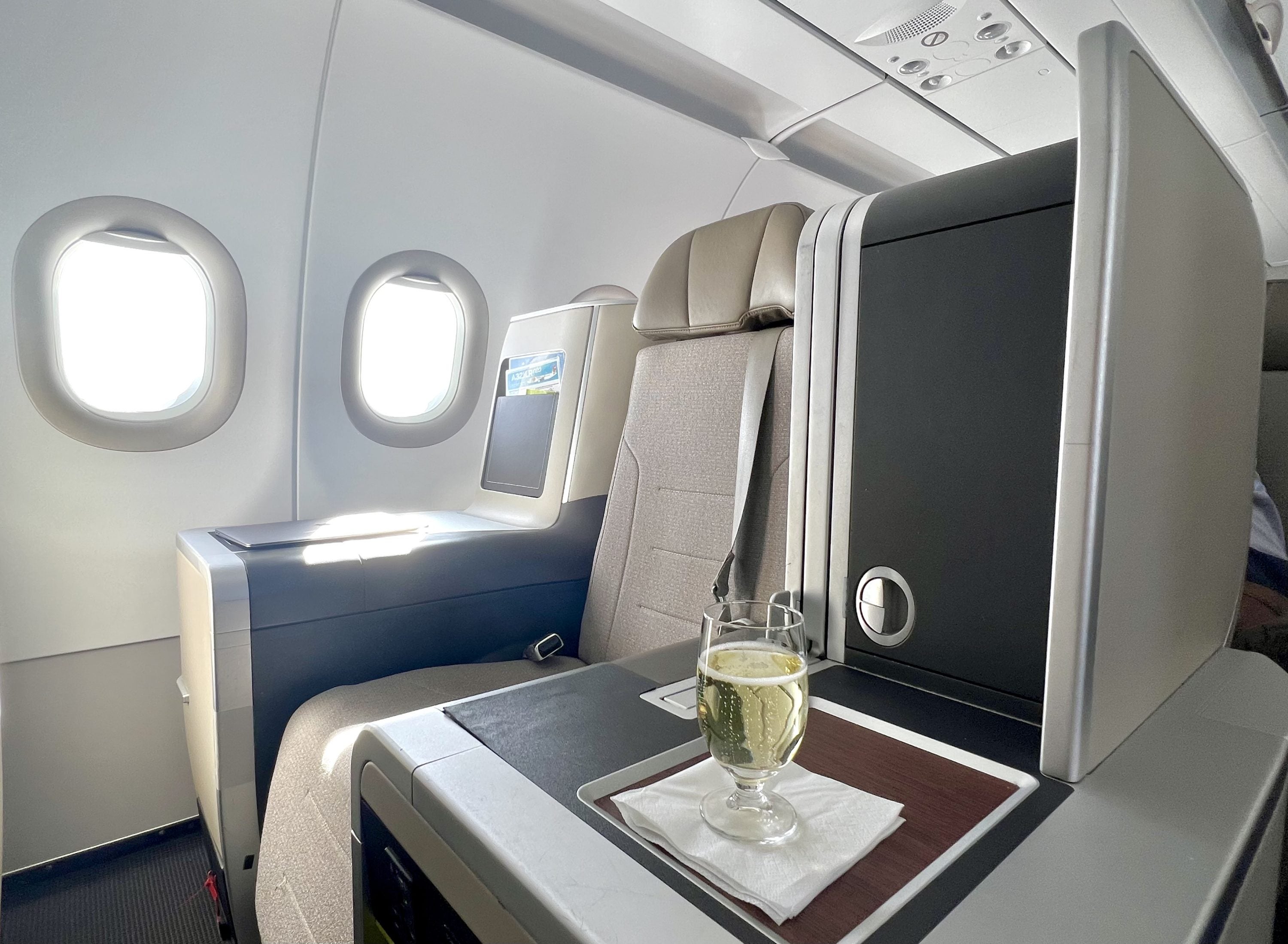 TAP Air Portugal Airbus A321LRneo business class seat and sparkling wine