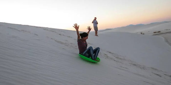 Sledding White Sands National Park