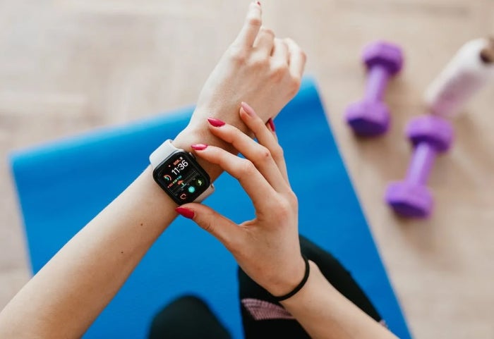 Smartwatch on womans wrist Smartwatch on womans wrist