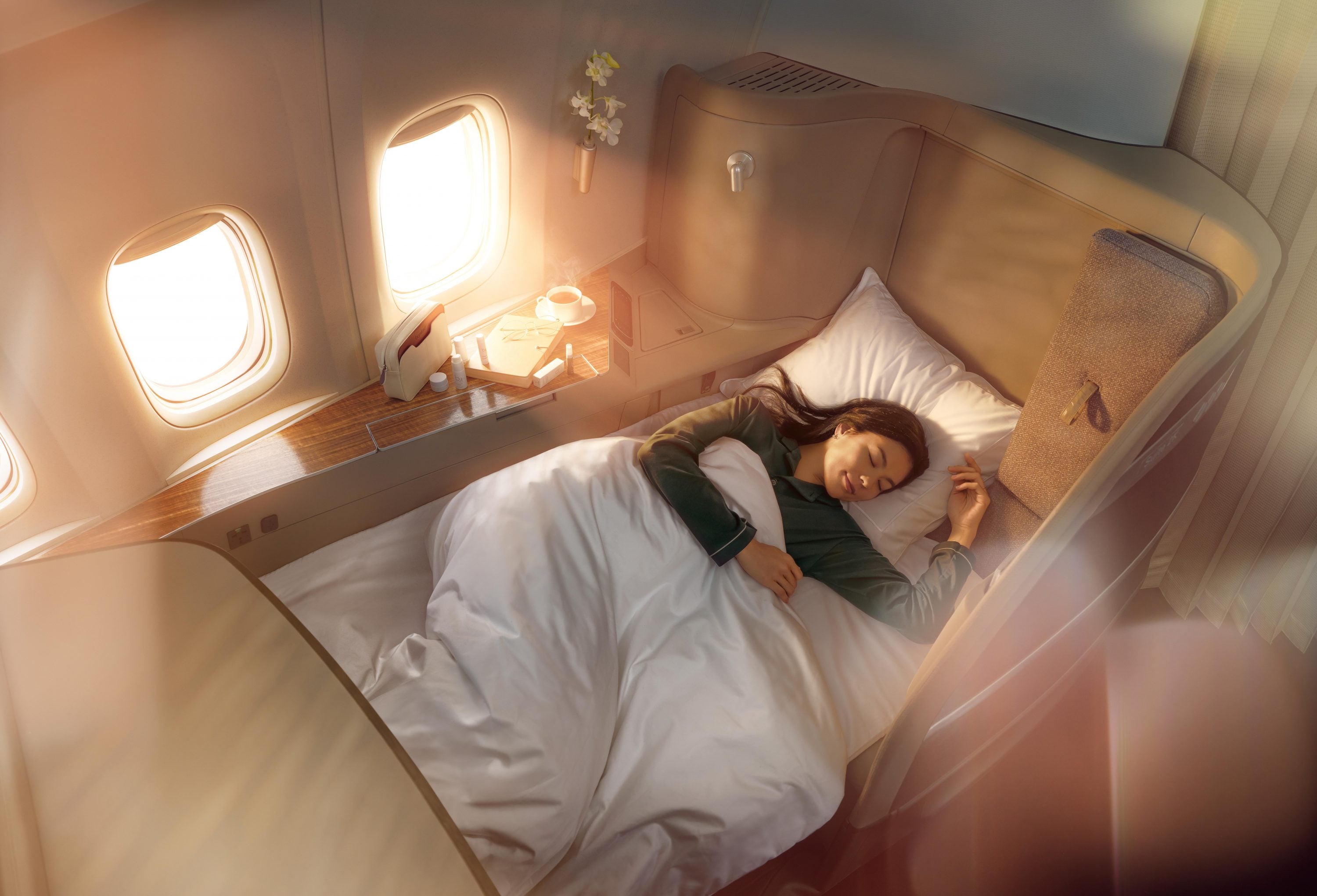 Cathay Pacific first class resting in bed