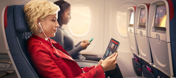 Delta female passenger economy wi fi