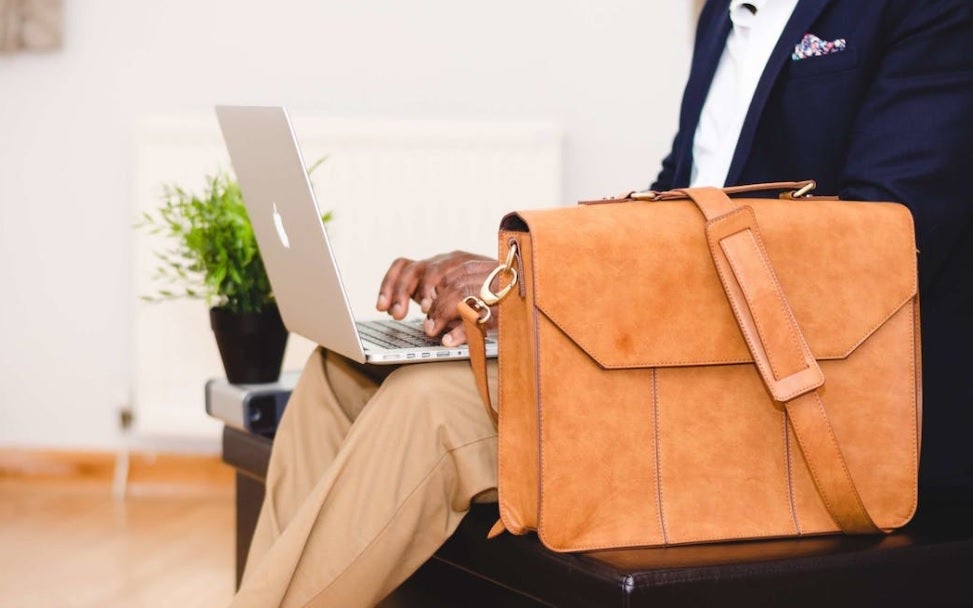 Man with laptop and briefcase