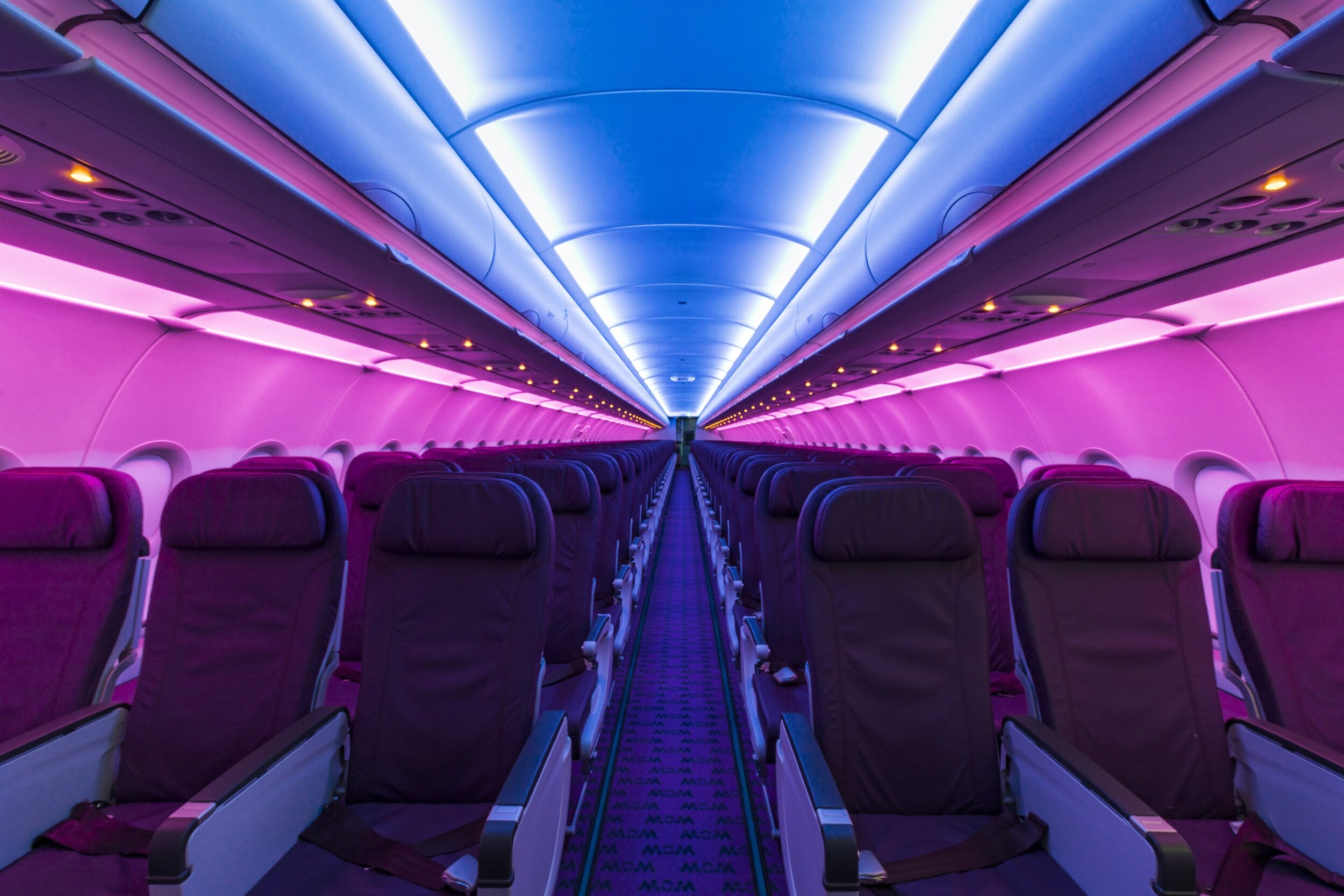 lit interior of WOW air plane
