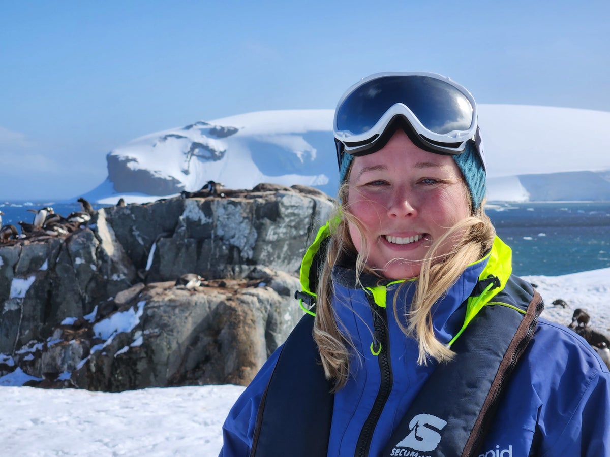 Carissa Rawson Antarctica with penguins