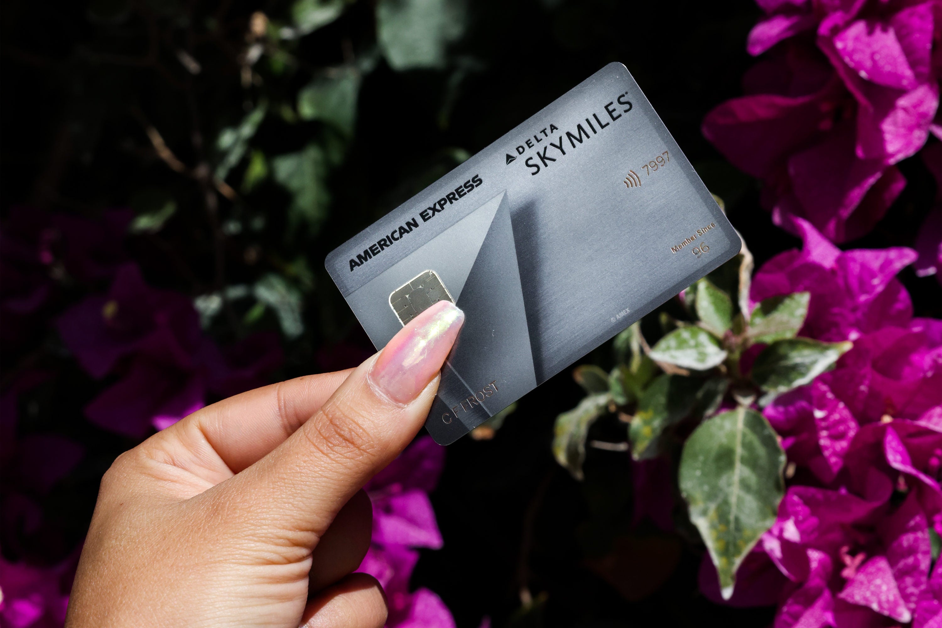 How To Upgrade A Delta Gold Card To A Delta Platinum Card 2024   Delta SkyMiles Platinum American Express Card Against Flowers 