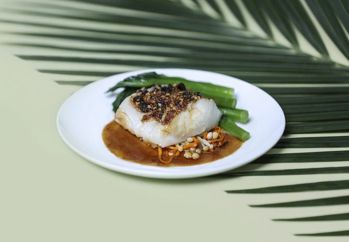 Steamed halibut with cordyceps flowers, aged mandarin peel, and preserved black olives