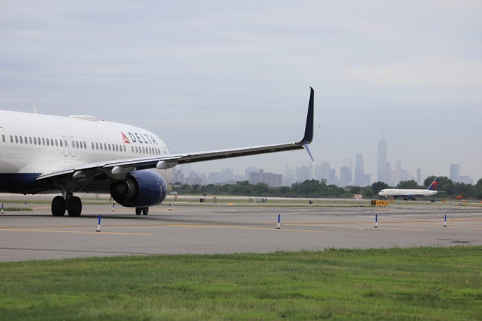 A Delta plane taxiing at JFK Airport A Delta plane taxiing at JFK Airport