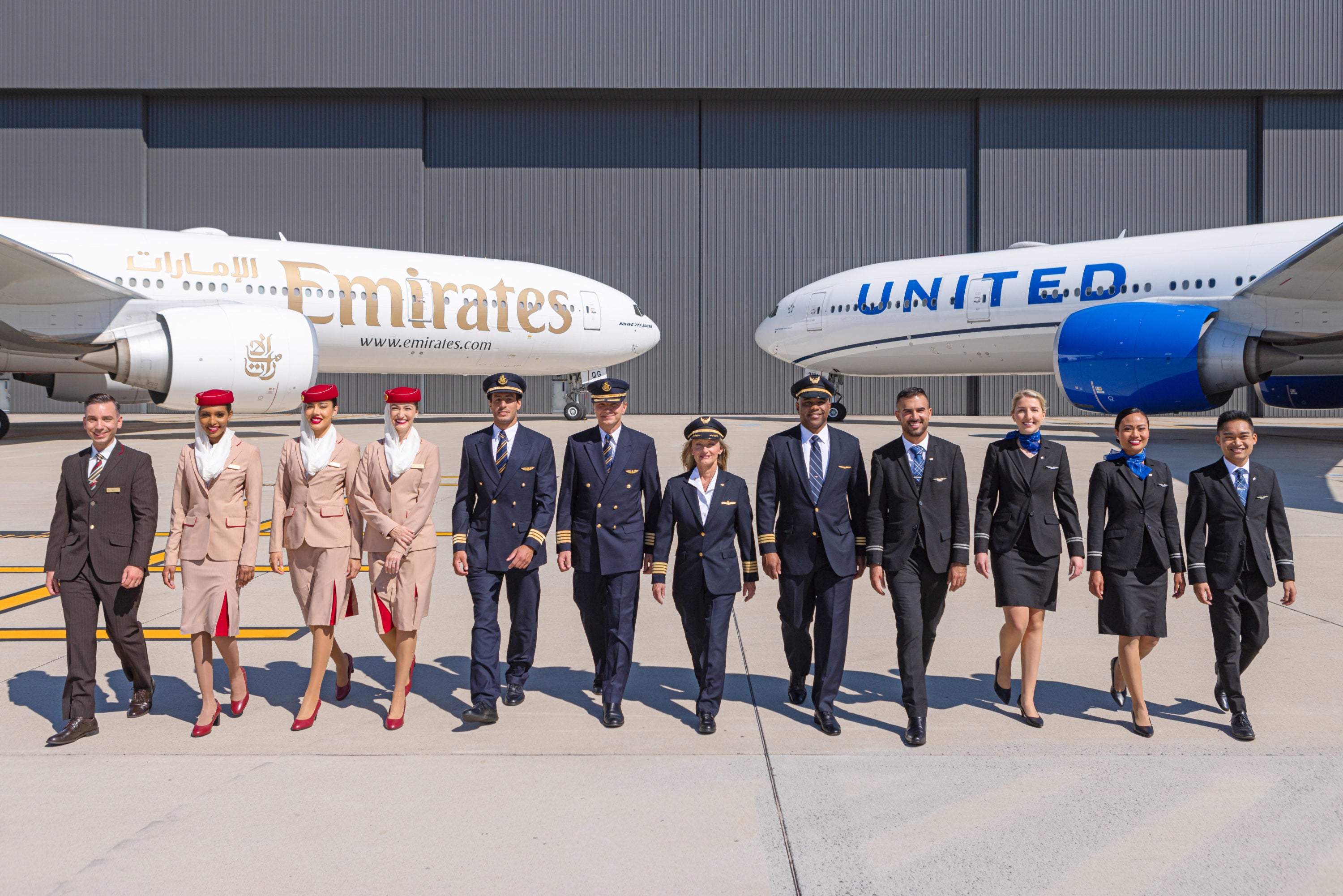 Emirates and United planes and crew