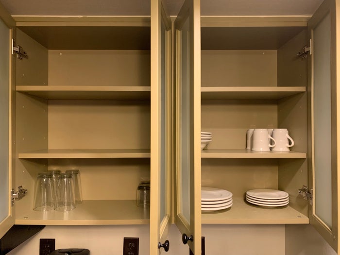 Inside the cabinets in the guestroom at Homewood Suites Austin Round Rock