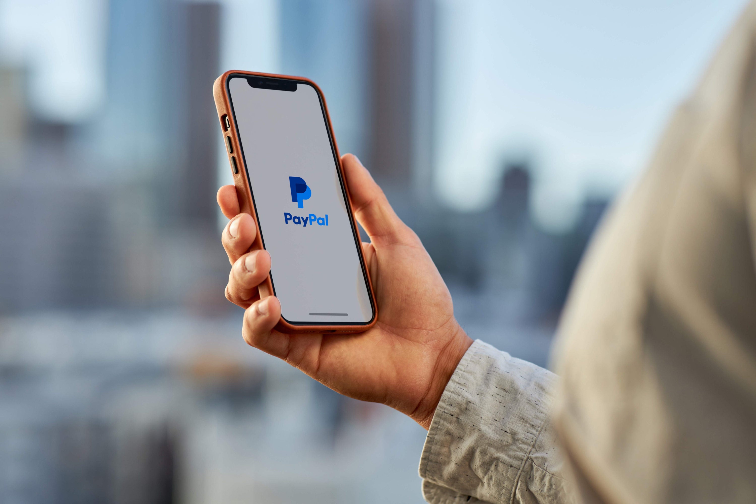 PayPal app on phone outdoors