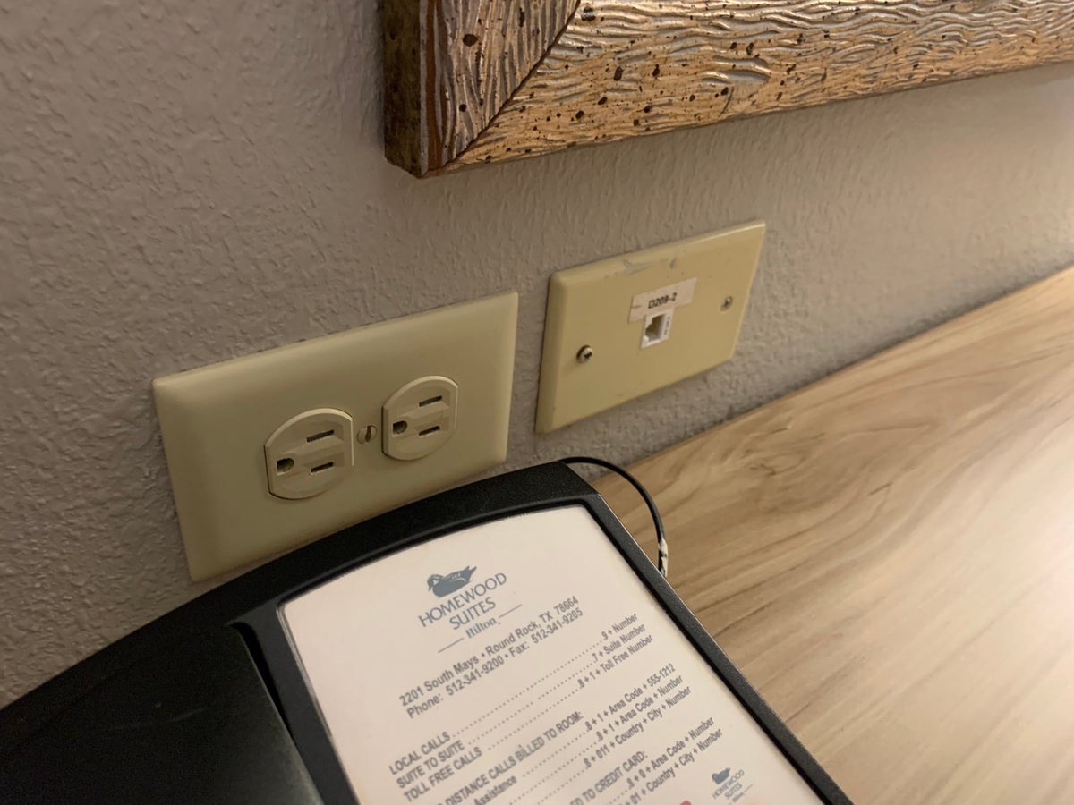 Power outlet at the bedroom desk at Homewood Suites Austin Round Rock