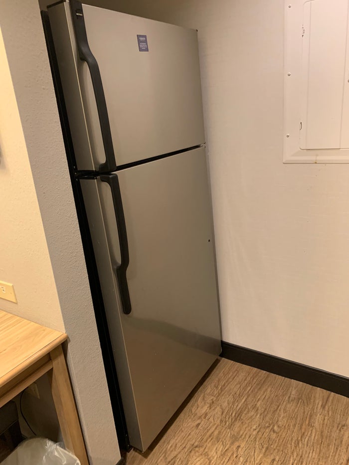 Refrigerator in the guestroom at Homewood Suites Austin Round Rock