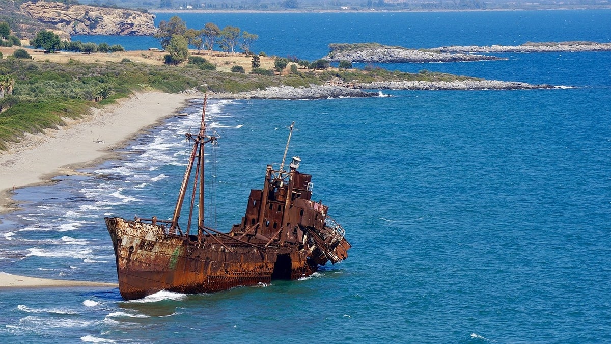 Shipwreck on Valtaki Beach in Peloponnese Greece Shipwreck on Valtaki Beach in Peloponnese Greece