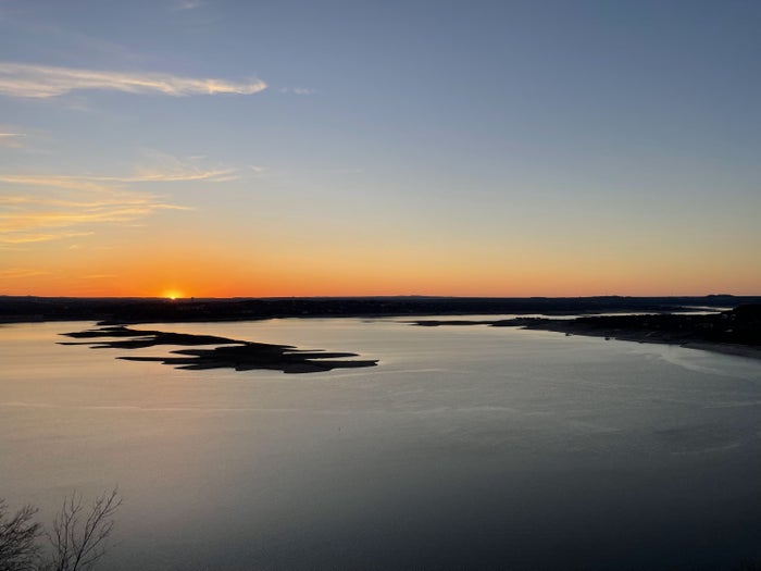 Sunset view of the lake from The Oasis Restaurant in Austin