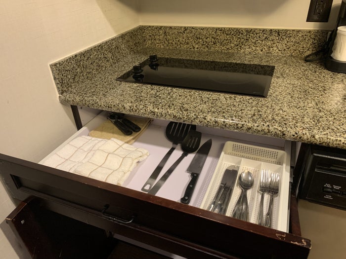 Utensils in the guestroom kitchen at Homewood Suites Austin Round Rock