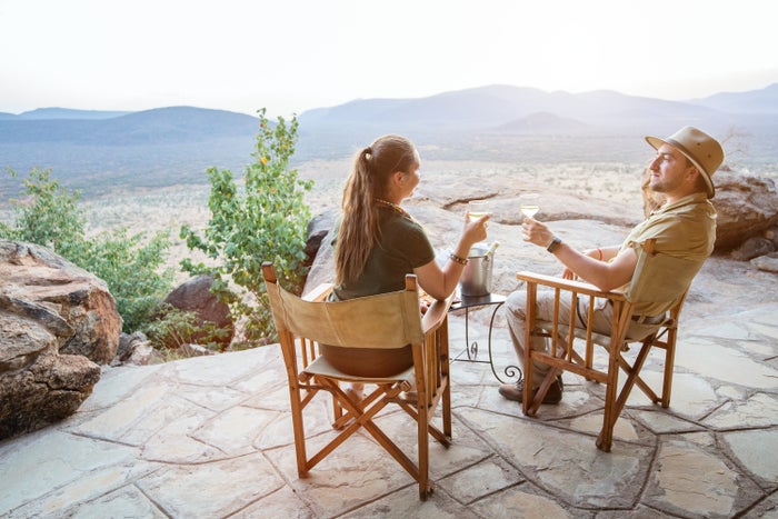A couple toast while on safari. A couple toast while on safari.