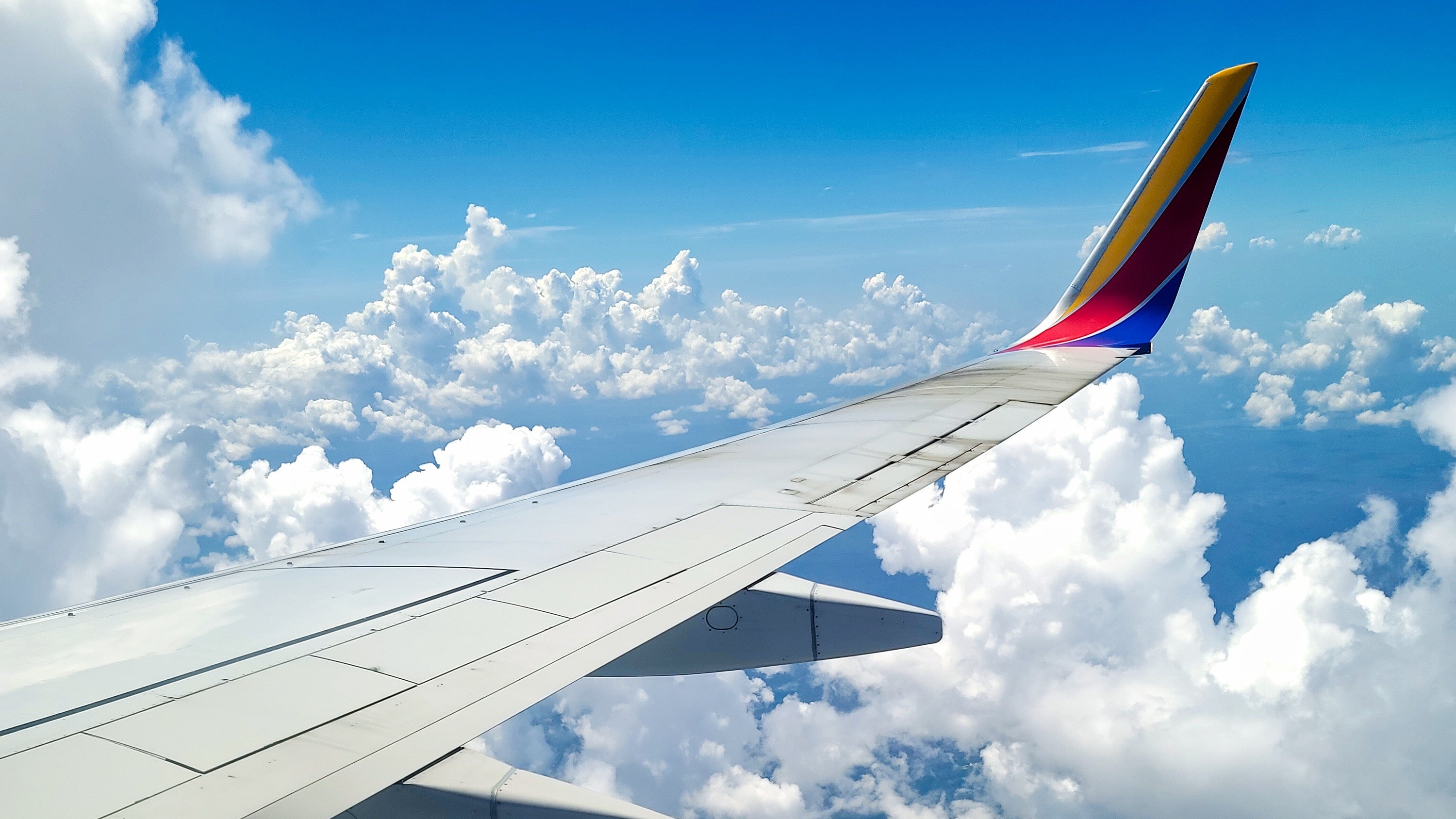 Southwest Airlines wing in clouds