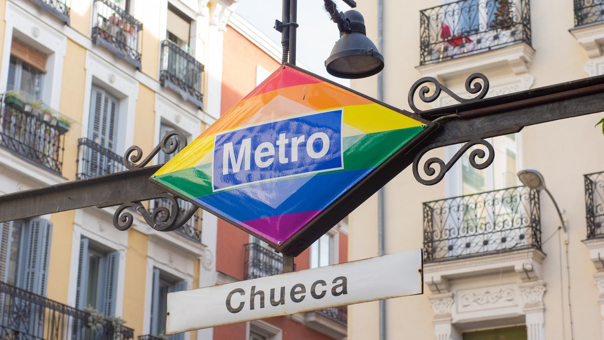 Chueca rainbow Metro sign
