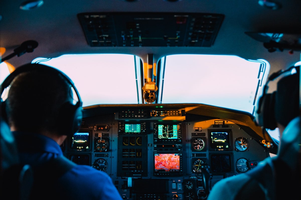 A cockpit with pilots