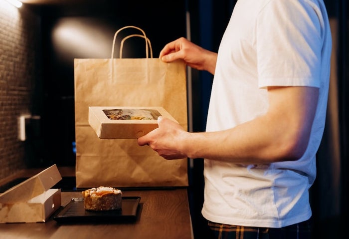 Man Opening Food Delivery Man Opening Food Delivery