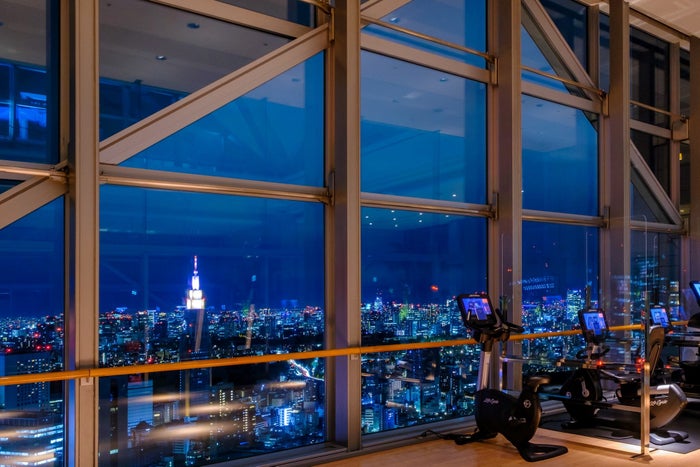The fitness center at the Park Hyatt Tokyo features incredible views The fitness center at the Park Hyatt Tokyo features incredible views