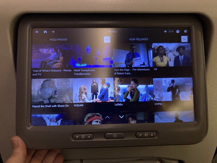Qatar Airways 777 DOH DFW economy IFE screen adjustment Qatar Airways 777 DOH DFW economy IFE screen adjustment