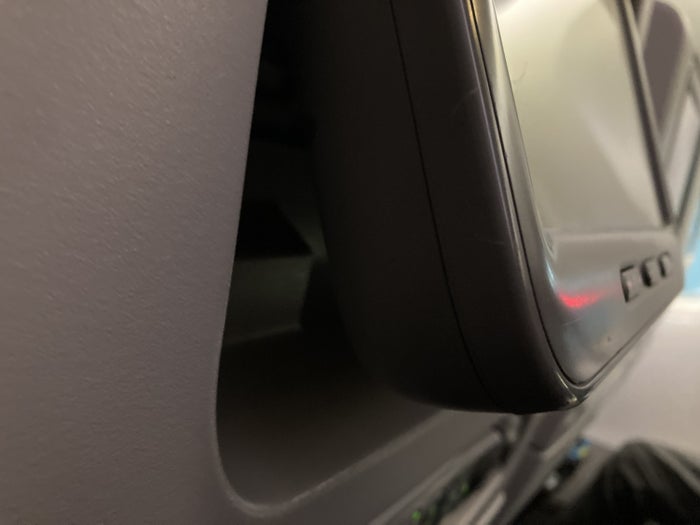 Qatar Airways 777 DOH DFW economy IFE screen tilt Qatar Airways 777 DOH DFW economy IFE screen tilt
