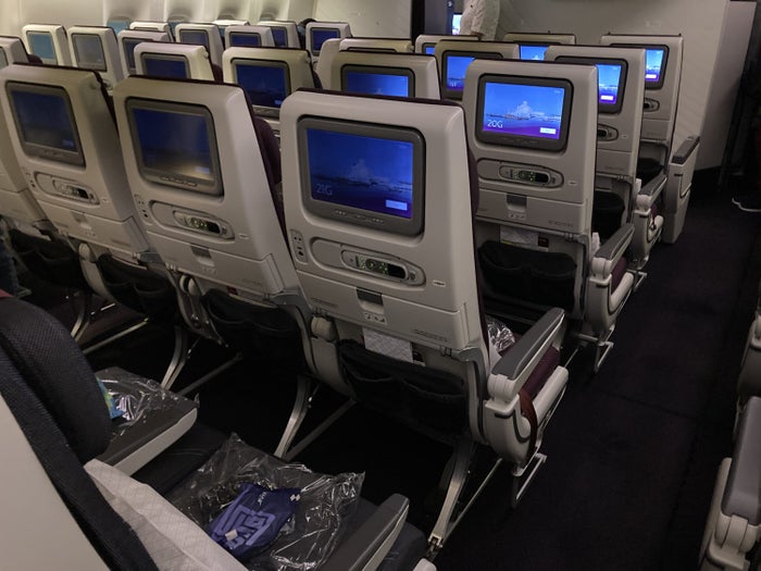 Qatar Airways 777 DOH DFW economy IFE seatbacks Qatar Airways 777 DOH DFW economy IFE seatbacks