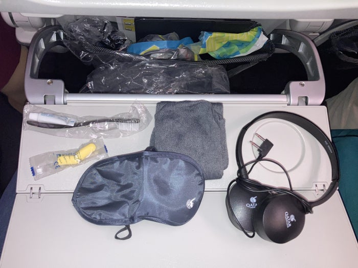 Qatar Airways 777 DOH DFW economy amenity kit items Qatar Airways 777 DOH DFW economy amenity kit items