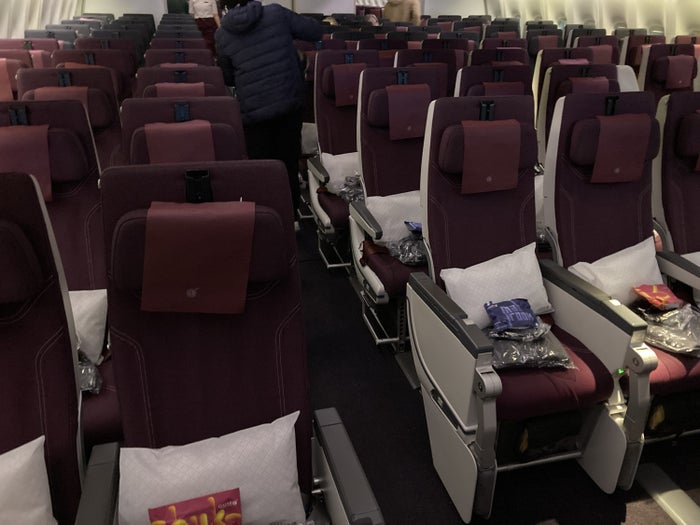 Qatar Airways 777 DOH DFW economy cabin Qatar Airways 777 DOH DFW economy cabin