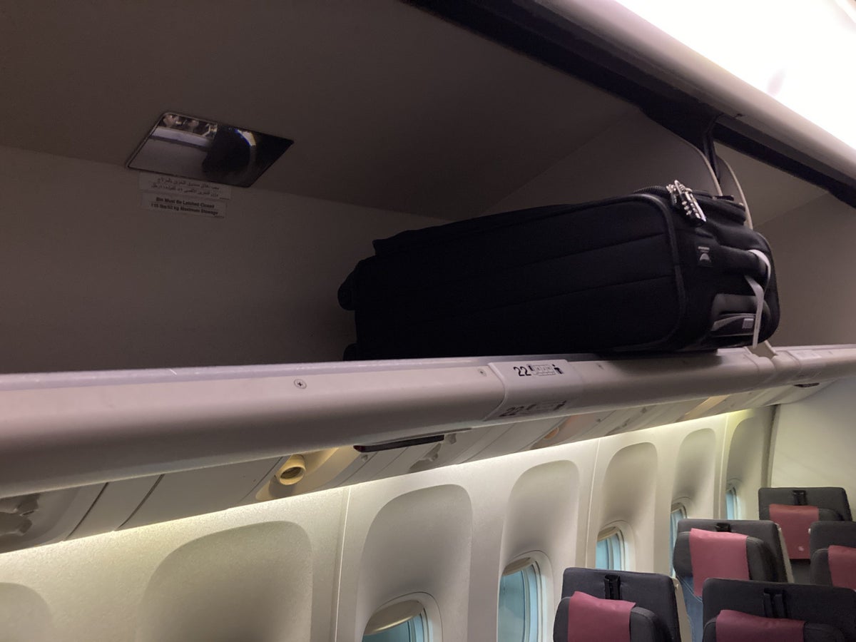 Qatar Airways 777 DOH DFW economy luggage storage