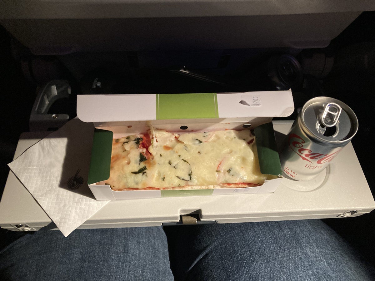 Qatar Airways 777 DOH DFW economy pizza open