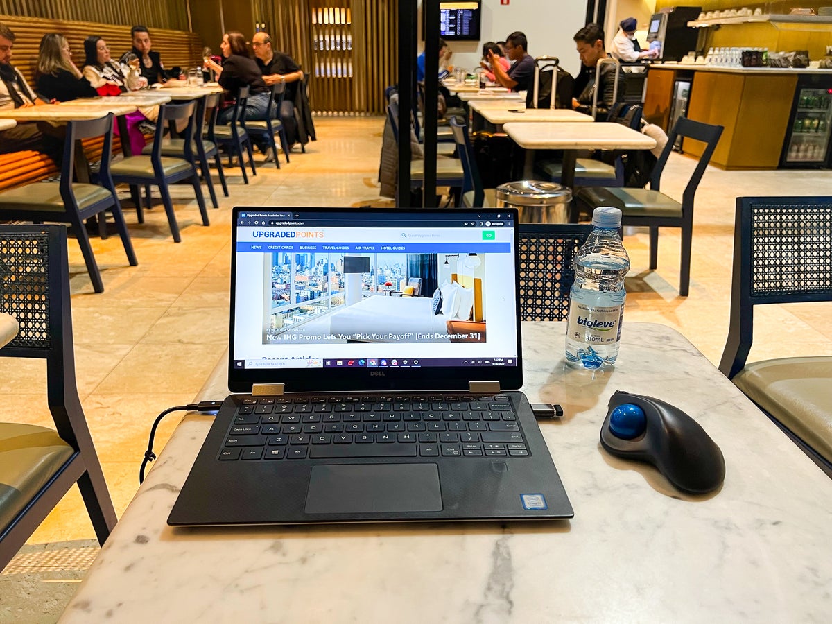 laptop and water at LATAM VIP Lounge GRU