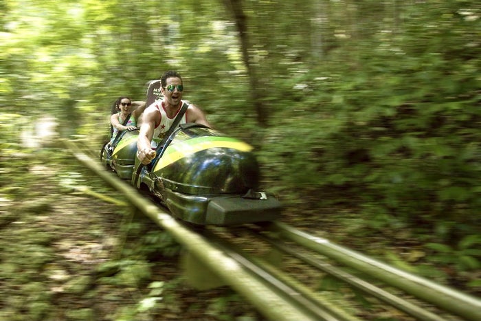 Bobsled Mystic Mountain Jamaica A couple bobsleding through the jungle