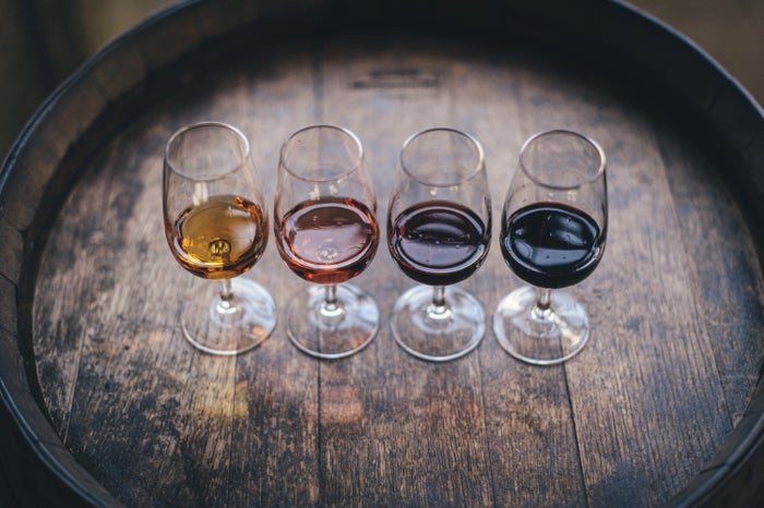 Port wine in Portugal 4 wine glasses on a barrel